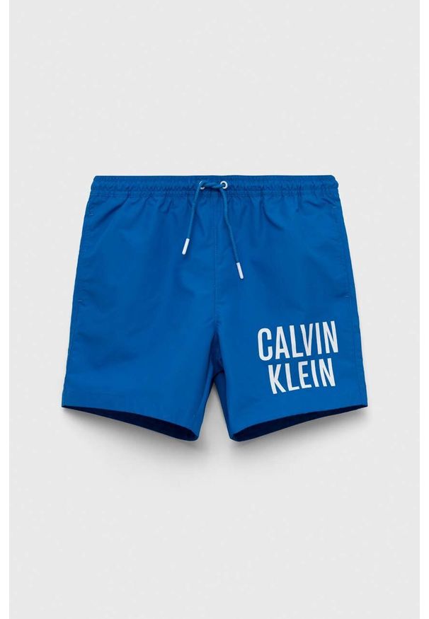 Calvin Klein Jeans szorty kąpielowe dziecięce kolor niebieski. Kolor: niebieski. Materiał: poliester, materiał. Wzór: nadruk