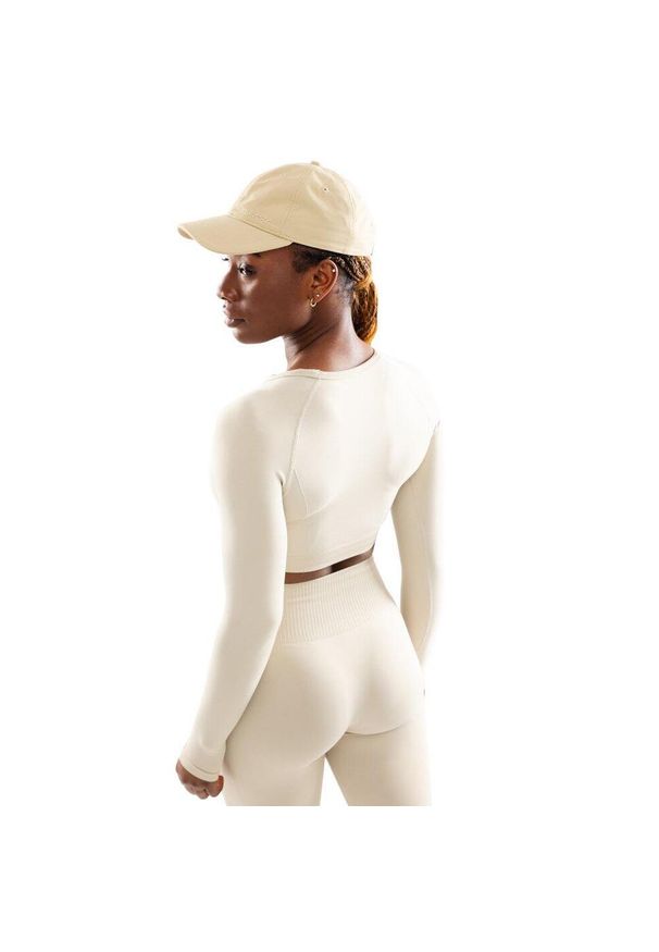SIROKO - Damska bezszwowa sportowa koszulka crop top z długim rękawem Fitness Siroko Vi. Okazja: na co dzień. Kolor: beżowy. Materiał: tkanina, materiał. Długość rękawa: długi rękaw. Długość: długie. Styl: sportowy