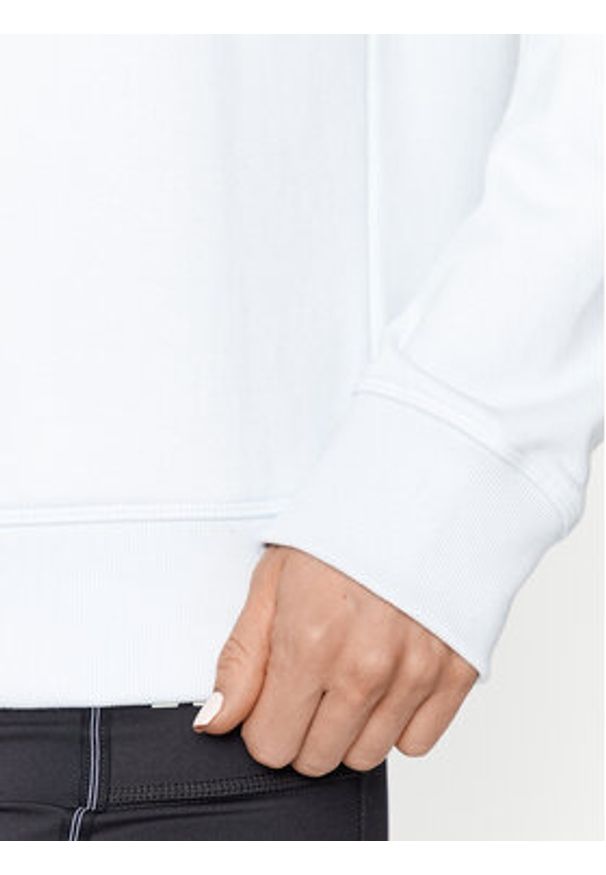 New Balance Bluza Essentials Stacked Logo French Terry Crewneck WT31532 Niebieski Regular Fit. Kolor: niebieski. Materiał: bawełna