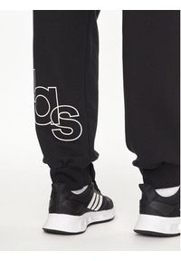 Adidas - adidas Spodnie dresowe Graphic Print IP4073 Czarny Regular Fit. Kolor: czarny. Materiał: bawełna. Wzór: nadruk #6