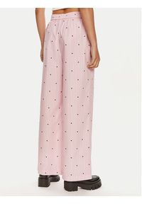 ROTATE Spodnie materiałowe 1125002976 Różowy Straight Fit. Kolor: różowy. Materiał: bawełna #5