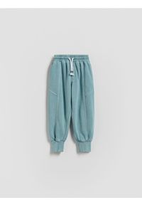 Reserved - Bawełniane joggery - jasnoniebieski. Kolor: niebieski. Materiał: bawełna #1