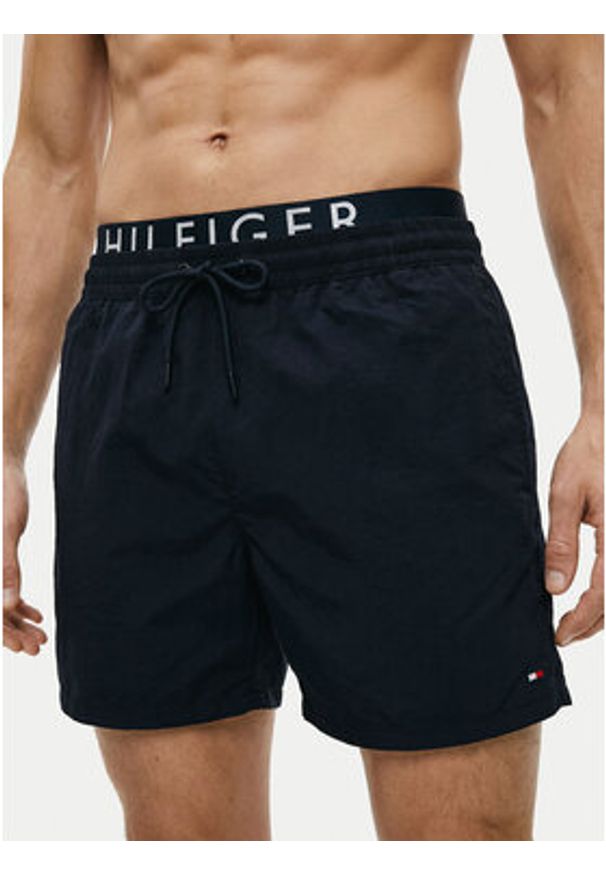 TOMMY HILFIGER - Tommy Hilfiger Szorty kąpielowe UM0UM03749 Granatowy Regular Fit. Kolor: niebieski. Materiał: syntetyk