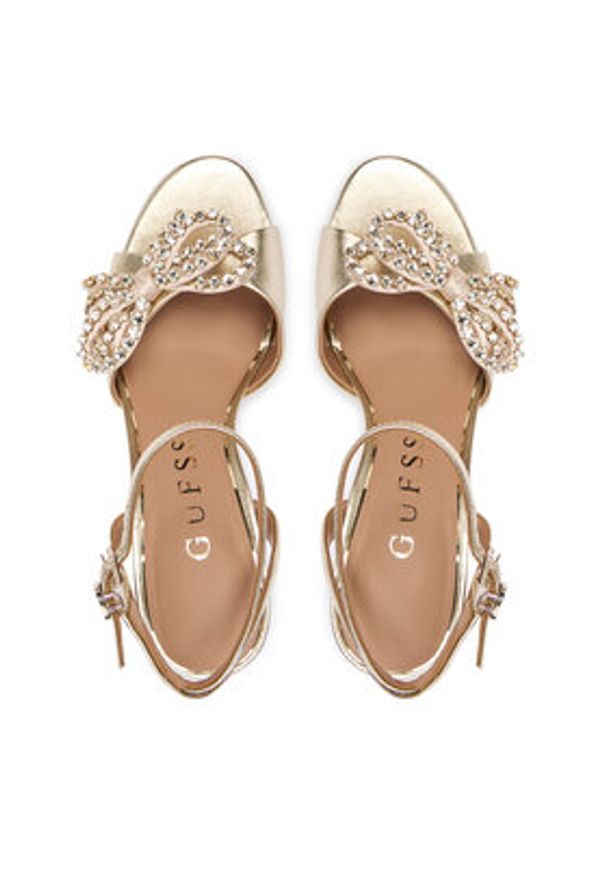 Guess Sandały FLFCR2 LEA03 Złoty. Kolor: złoty. Materiał: skóra