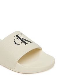 Calvin Klein Jeans Japonki Slide Monogram Wn Logo Ck YW0YW01967 Beżowy. Kolor: beżowy. Materiał: materiał #4