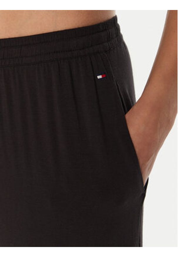 TOMMY HILFIGER - Tommy Hilfiger Spodnie piżamowe UW0UW05575 Czarny Relaxed Fit. Kolor: czarny
