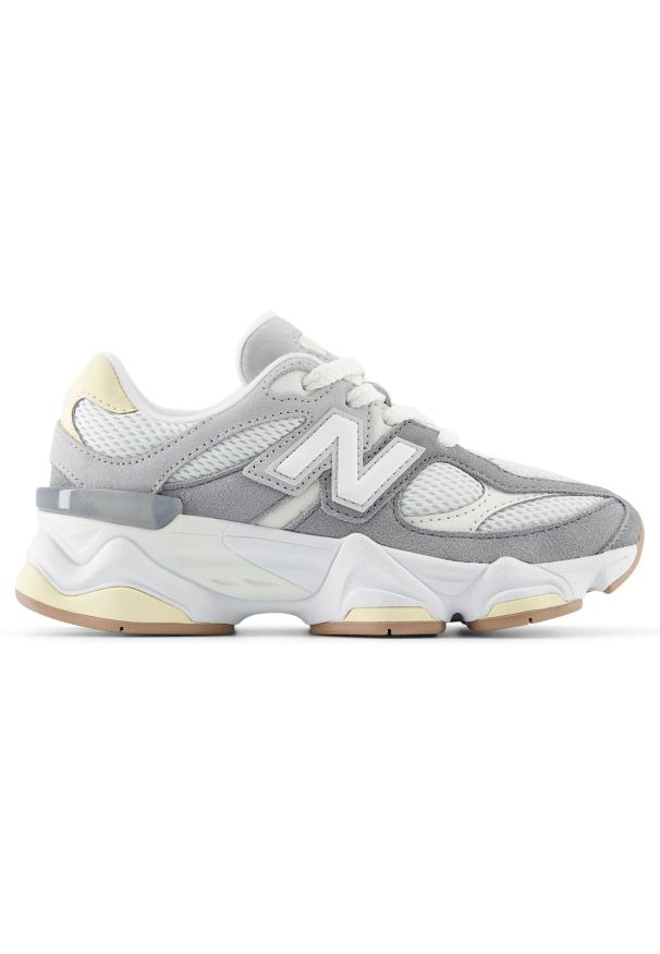 Buty dziecięce New Balance PC9060AB – szare. Okazja: na co dzień, na uczelnię. Kolor: szary. Materiał: guma, materiał, skóra, syntetyk. Szerokość cholewki: normalna. Sport: turystyka piesza