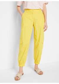 bonprix - "Spodnie bojówki ""papertouch"", O-shape". Kolor: żółty. Materiał: bawełna