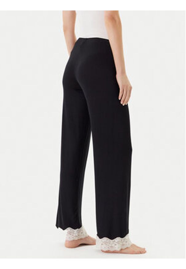 United Colors of Benetton - United Colors Of Benetton Spodnie piżamowe 3Z123F04A Czarny Regular Fit. Kolor: czarny. Materiał: wiskoza