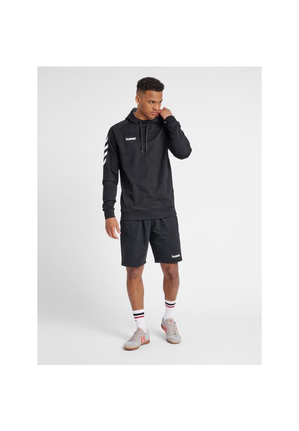Bluza sportowa z kapturem męska Hummel Go Cotton Hoodie. Typ kołnierza: kaptur. Kolor: czarny. Sport: taniec, joga i pilates