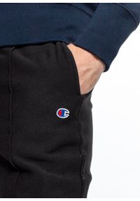 Spodnie dresowe męskie Champion Reverse Weave Cuffed Joggers (215162-KK001). Kolor: czarny. Materiał: dresówka #3