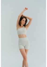 MOONHOLI - Szorty damskie do jogi Moonholi Glam z kieszeniami. Kolor: biały. Sport: joga i pilates