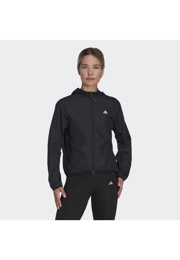 Adidas - Run It Windbreaker. Kolor: czarny. Materiał: materiał. Sport: bieganie