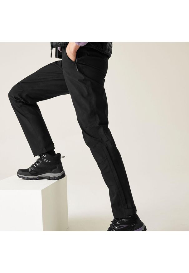 Regatta - Damskie wodoodporne spodnie Highton Stretch. Kolor: czarny. Sezon: lato. Sport: turystyka piesza