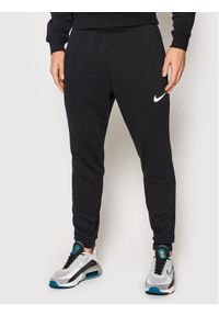 Nike Spodnie dresowe Dri-Fit CZ6379 Czarny Standard Fit. Kolor: czarny. Materiał: bawełna. Technologia: Dri-Fit (Nike)