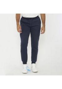 LEGEA - Spodnie sportowe SOFIA oversize niebieskie. Kolor: niebieski. Sport: fitness #1