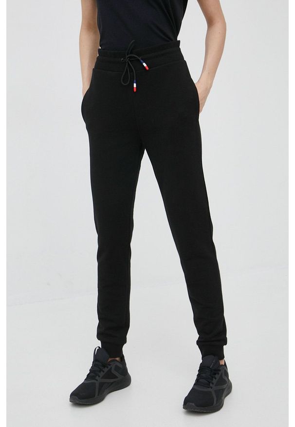 Rossignol spodnie dresowe bawełniane damskie kolor czarny gładkie. Kolor: czarny. Materiał: bawełna, dresówka. Wzór: gładki
