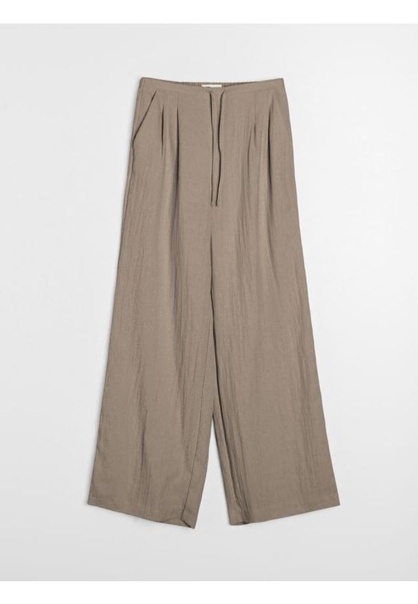 Sinsay - Spodnie wide leg z domieszką wiskozy - beżowy. Kolor: beżowy. Materiał: wiskoza