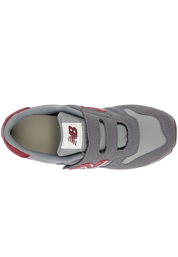 Buty dziecięce New Balance YZ373VM2 – szare. Zapięcie: rzepy. Kolor: szary. Materiał: materiał, syntetyk, guma. Szerokość cholewki: normalna. Model: New Balance 373