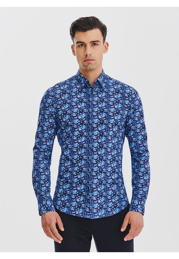 Pako Lorente - PAKO LORENTE – Granatowa dzianinowa koszula w kwiaty. Kolor: niebieski. Materiał: dzianina. Długość rękawa: długi rękaw. Długość: długie. Wzór: kwiaty