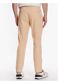 Tommy Jeans Spodnie materiałowe Austin DM0DM15964 Beżowy Slim Fit. Kolor: beżowy. Materiał: bawełna