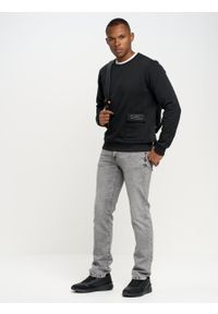 Big-Star - Bluza męska czarna Hugoner 906. Okazja: na co dzień. Kolor: czarny. Materiał: dzianina, jeans. Wzór: aplikacja, nadruk. Styl: sportowy, casual, klasyczny