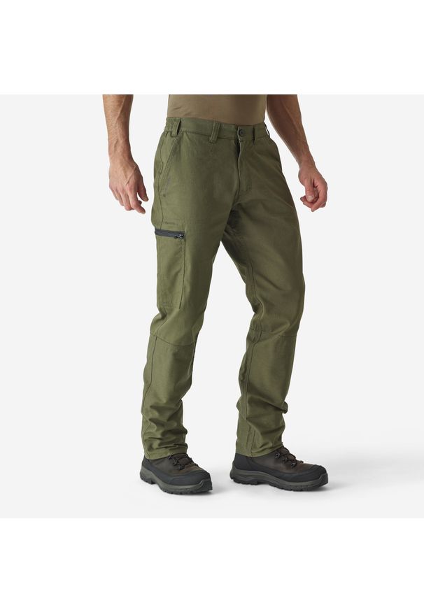 SOLOGNAC - Spodnie outdoor Solognac Steppe 100 V2. Kolor: zielony, brązowy, wielokolorowy. Materiał: materiał, bawełna, poliester. Sport: outdoor