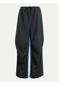 Adidas - adidas Spodnie dresowe Express IX3737 Czarny Loose Fit. Kolor: czarny. Materiał: syntetyk #6
