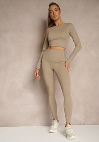 Renee - Beżowy Komplet Sportowy Legginsy i Top Typu Longsleeve Dorotia. Kolor: beżowy. Materiał: skóra