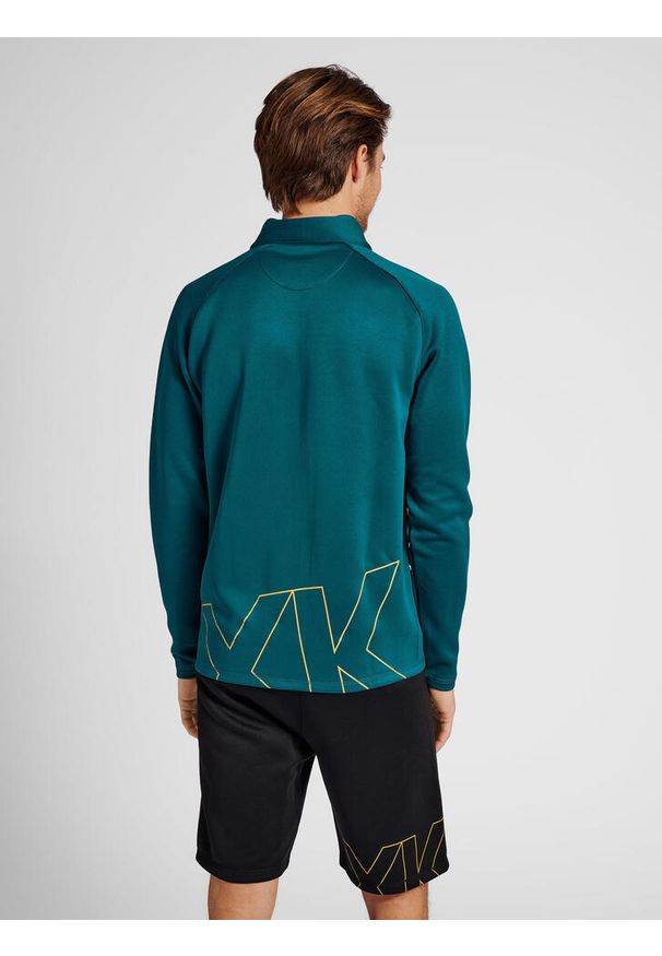 Bluza dresowa zapinana na zamek błyskawiczny Hummel Cima XK. Kolor: niebieski. Materiał: dresówka. Wzór: nadruk. Sport: piłka ręczna