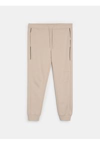 Sinsay - Spodnie dresowe jogger - beżowy. Kolor: beżowy. Materiał: dresówka #1