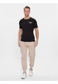 Calvin Klein Jeans Spodnie dresowe Monologo J30J324685 Beżowy Regular Fit. Kolor: beżowy. Materiał: bawełna, dresówka #4