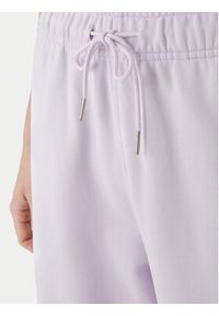 Calvin Klein Jeans Spodnie dresowe Embossed Monologo LV047F206G Różowy Regular Fit. Kolor: różowy. Materiał: bawełna #2