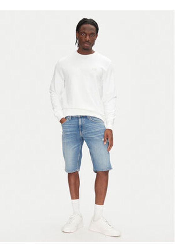 Tommy Jeans Szorty jeansowe Ronnie DM0DM21331 Niebieski Regular Fit. Kolor: niebieski. Materiał: bawełna