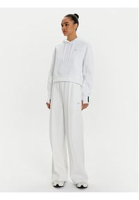 Lacoste Spodnie dresowe XF7374 Biały Wide Leg. Kolor: biały. Materiał: bawełna