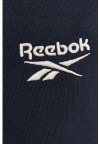 Reebok - Spodnie. Kolor: niebieski. Materiał: bawełna, poliester, dzianina. Wzór: gładki #2