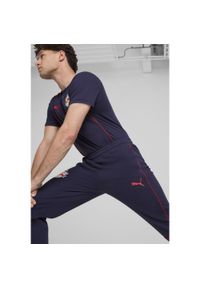 Puma - Męskie spodnie Casuals FC Red Bull Salzburg PUMA Navy Red Blue. Kolor: czerwony, wielokolorowy, niebieski. Materiał: materiał