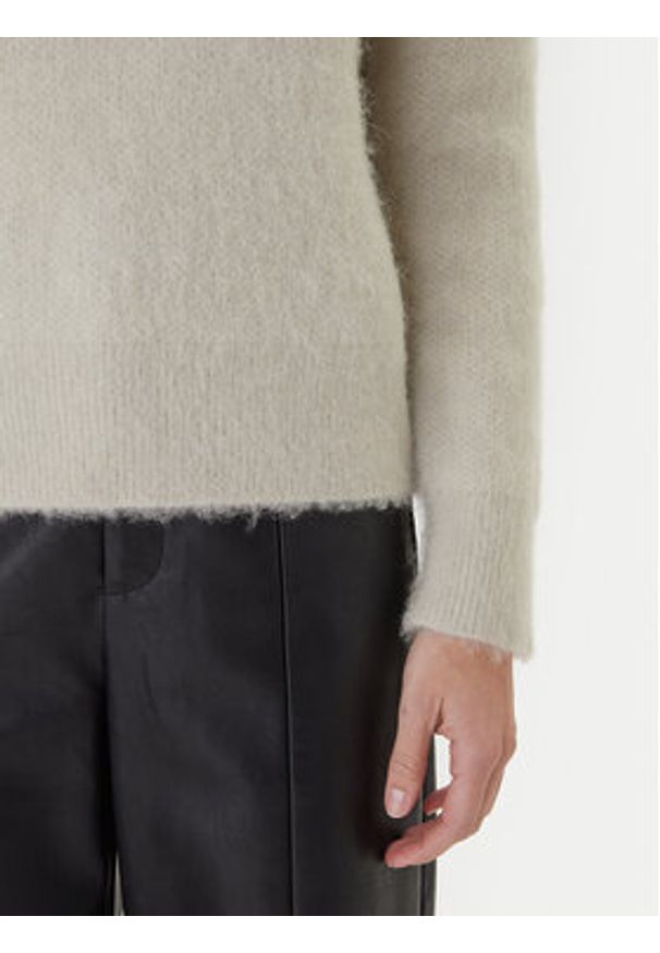 Calvin Klein Sweter LV044D359G Beżowy Relaxed Fit. Kolor: beżowy. Materiał: syntetyk