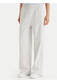 TOMMY HILFIGER - Tommy Hilfiger Spodnie dresowe UW0UW06180 Szary Wide Leg. Kolor: szary. Materiał: bawełna #1