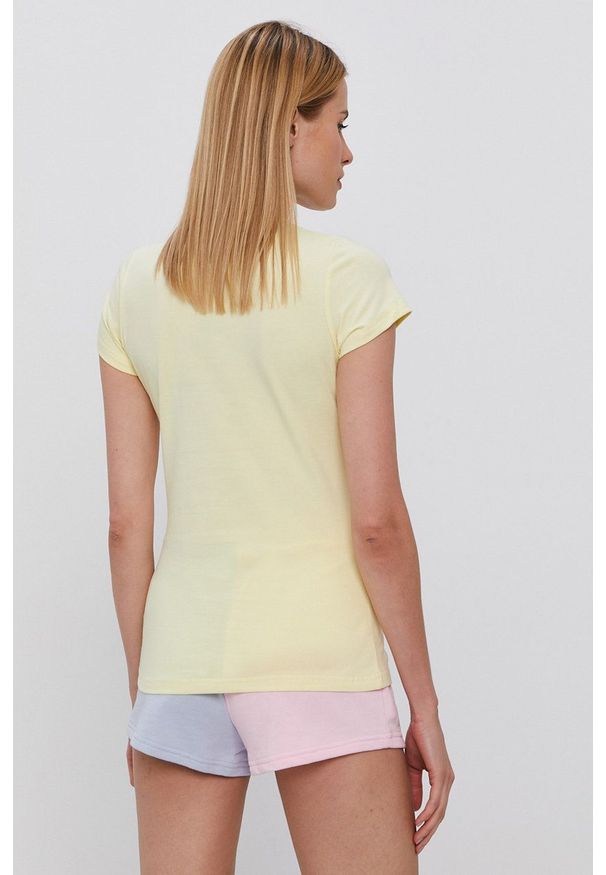 Ellesse T-shirt bawełniany SGJ11885-908. Okazja: na co dzień. Kolor: żółty. Materiał: bawełna. Wzór: aplikacja. Styl: casual