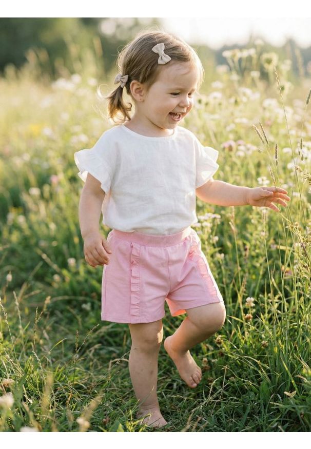 Sinsay - Bawełniane szorty z ozdobną falbanką - różowy. Kolor: różowy. Materiał: bawełna
