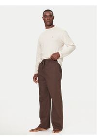 TOMMY HILFIGER - Tommy Hilfiger Spodnie piżamowe UM0UM03689 Brązowy Relaxed Fit. Kolor: brązowy. Materiał: bawełna