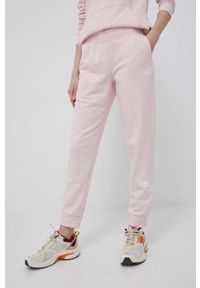 Puma spodnie damskie kolor różowy z nadrukiem. Kolor: różowy. Materiał: dzianina. Wzór: nadruk