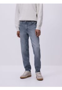 Reserved - Jeansy slim z efektem sprania - jasnoszary. Kolor: szary #1