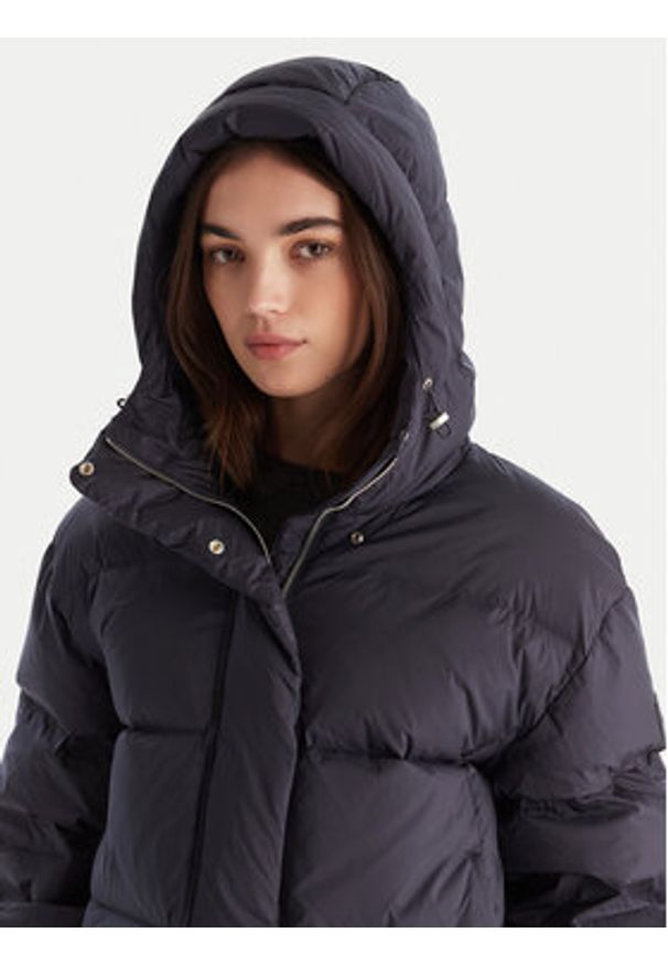 Calvin Klein Kurtka puchowa LV044D525G Granatowy Relaxed Fit. Kolor: niebieski. Materiał: syntetyk