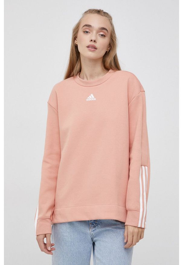 Adidas - adidas Bluza GS1374 damska kolor różowy gładka. Kolor: różowy. Materiał: bawełna, materiał, dzianina. Długość rękawa: długi rękaw. Długość: długie. Wzór: gładki