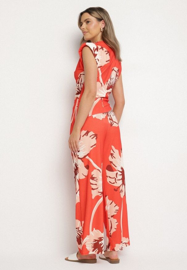 Born2be - Pomarańczowy Komplet w Kwiaty Asymetryczna Bluzka z Marszczeniem i Szerokie Spodnie Linamia. Kolor: pomarańczowy. Materiał: materiał. Wzór: kwiaty