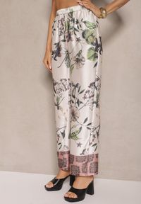 Renee - Beżowe Spodnie z Wiskozą o Szerokim Kroju High Waist w Kwiaty Davilsa. Okazja: na co dzień. Stan: podwyższony. Kolor: beżowy. Materiał: wiskoza. Wzór: kwiaty. Styl: casual