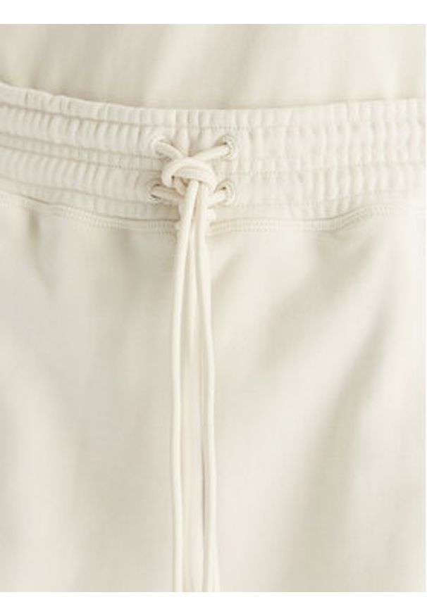Adidas by Stella McCartney - adidas by Stella McCartney Szorty sportowe True Casuals JX6786 Beżowy Loose Fit. Kolor: beżowy. Materiał: bawełna