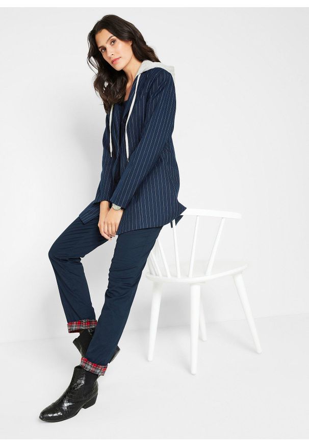 bonprix - Spodnie chino ocieplane. Kolor: niebieski